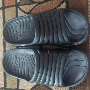 A pair of HOKA men's size 11 Like new